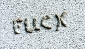 word that's made out of some kind of poured concrete and it's hardly visible if it's flick or fuck